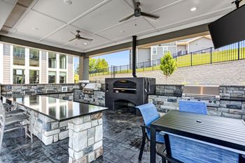 Outdoor kitchen with pizza oven